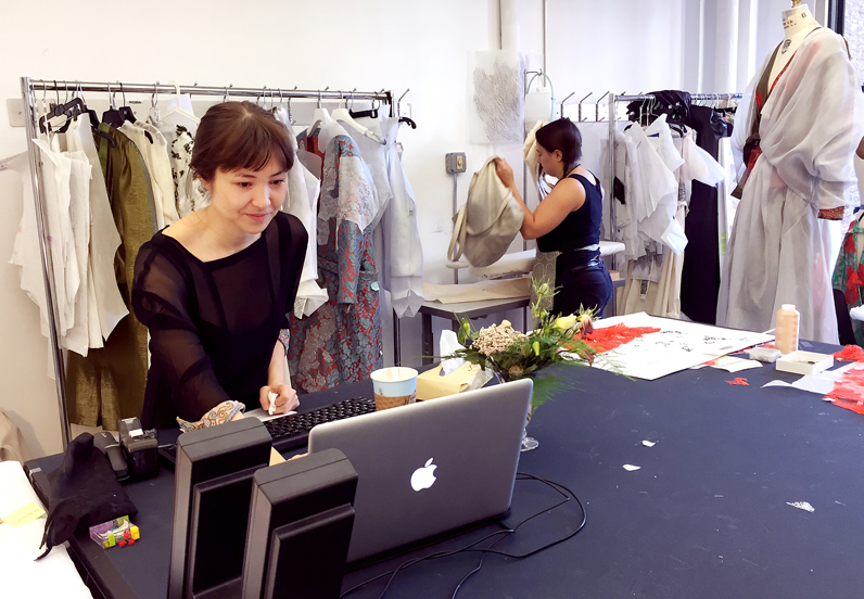 Maya Kano, a 2015 MFA graduate, works in the open studio space in the Parsons building. Photo by Kasia Broussalian.