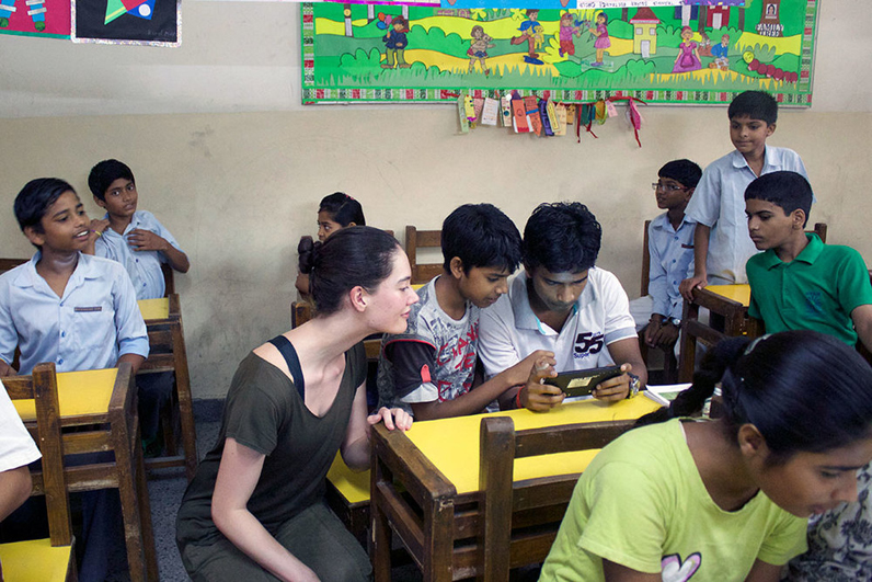 Kate Wallace introduces students in India to BeyondABC.