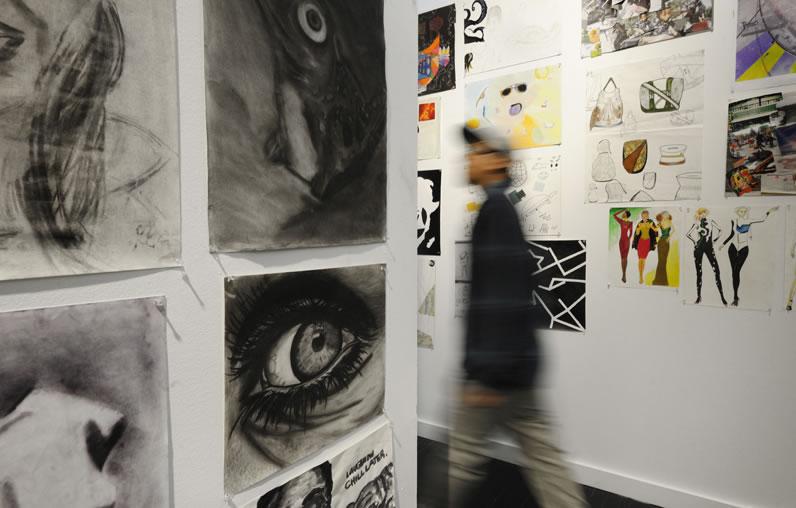 Student artwork adorns the walls at The New School's Pre-College Festival.