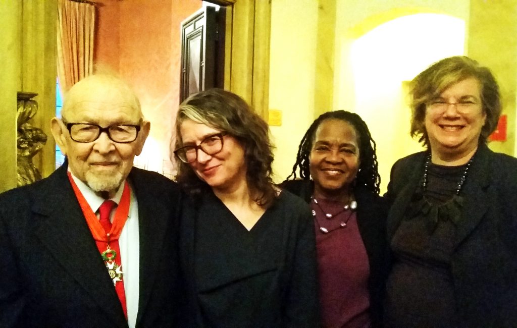 Justus Rosenberg, a longtime instructor in the Bachelor’s Program for Adults and Transfers (BPATS); Melissa Friedling, dean of the School of Undergraduate Studies; Thelma Armstrong, executive assistant to the dean; and Mary Watson, executive dean, at a ceremony in which Rosenberg was presented with the Legion of Honor.
