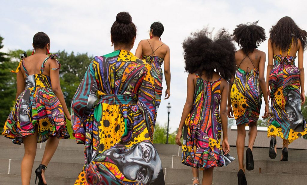 A group of models wear original designs by Kyemah McEntyre, Fashion Design '19 (Photo/LEESY)