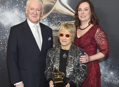 School of Jazz and Contemporary Music faculty member Jane Ira Bloom, center, with her Grammy for Best Surround Sound Album.