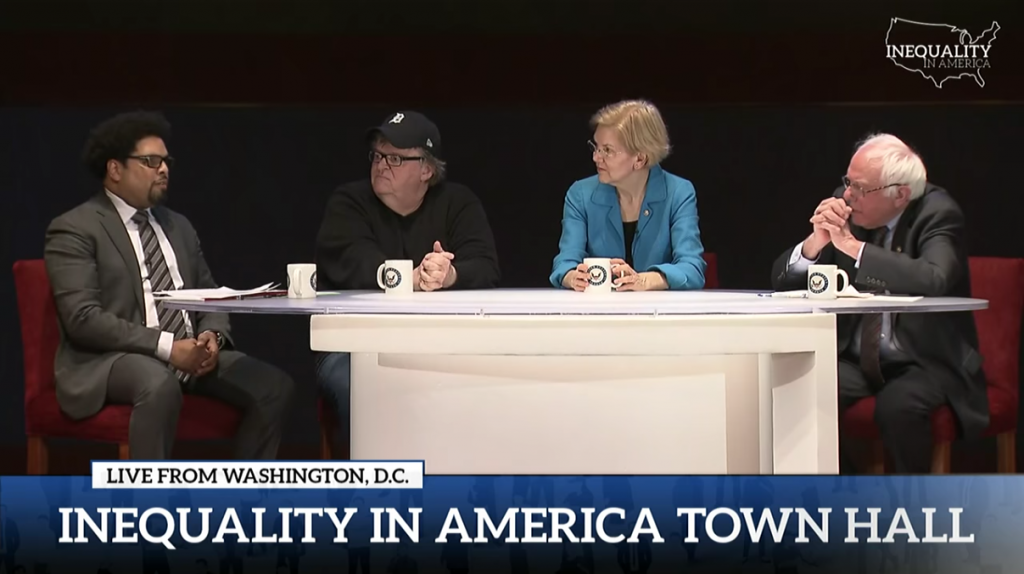 Darrick Hamilton, professor of economics and urban policy at the Milano School and The New School for Social Research, speaks during Inequality in America: A National Town Hall with filmmaker/activist Michael Moore, Sen. Elizabeth Warren, and Sen. Bernie Sanders.