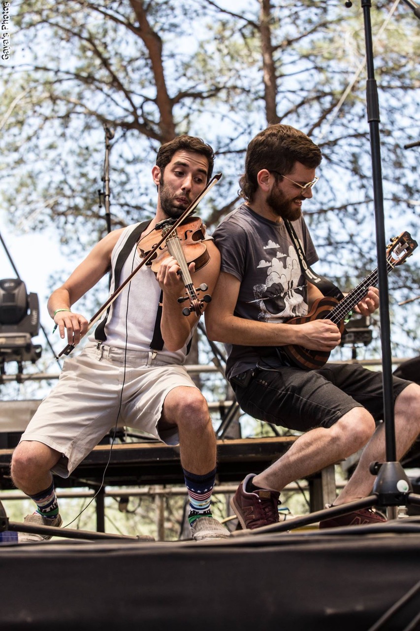 Ashano, on violin, performing with OSOG