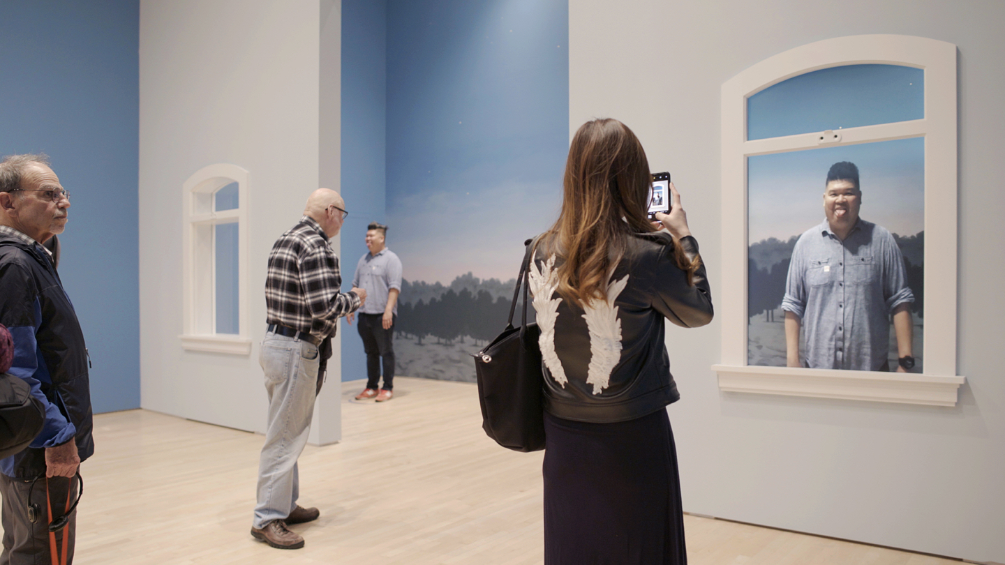 Visitors exploring the interactive art gallery at SFMOMA, created by Charles Yust, MFA Design and Technology '08, in his role as AR/VR project lead at frog design