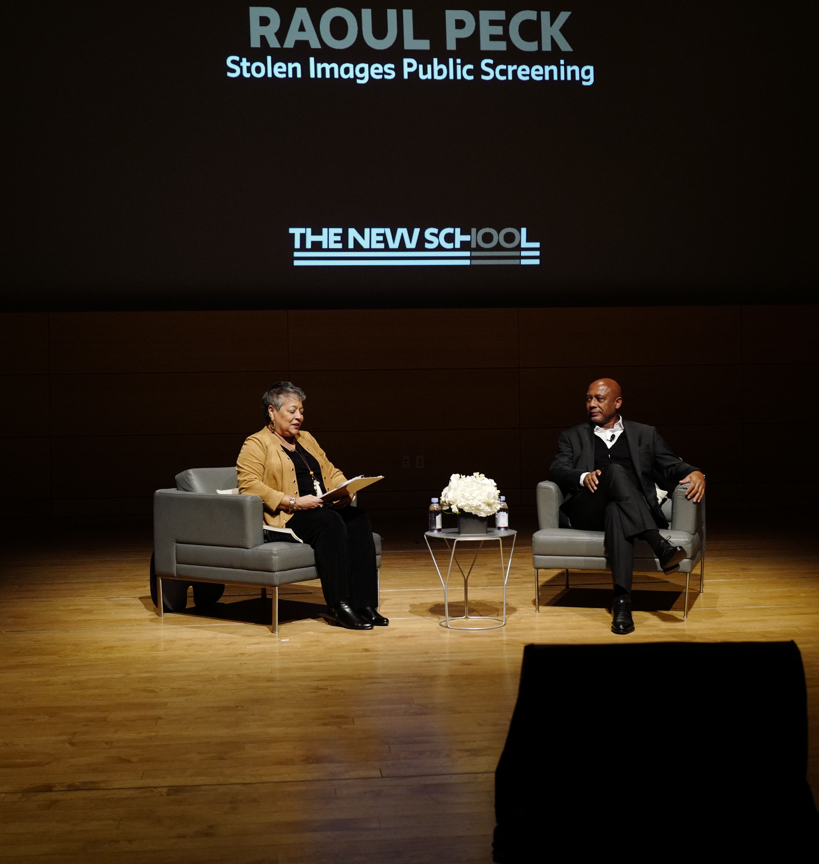 Director Raoul Peck being interviewed by Professor Michelle Materre 