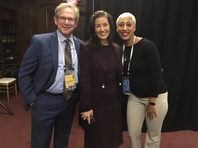 Professor Warren Speilberg at the My Brother's Keeper Conference with Oakland Mayor Libby  Schaaf and mayoral staff member. 