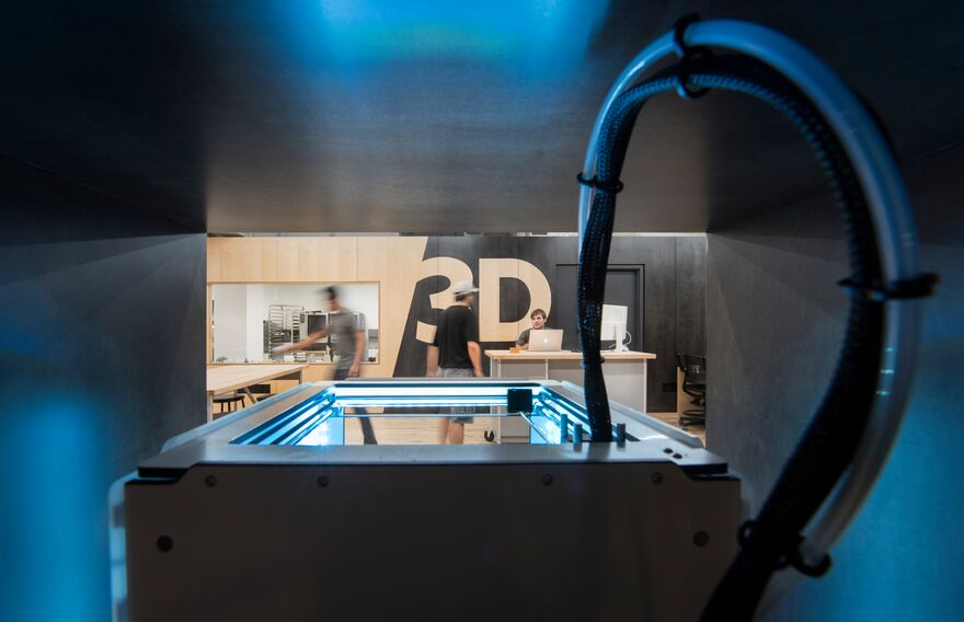 A view of a 3D printer in the Making Center at Parsons