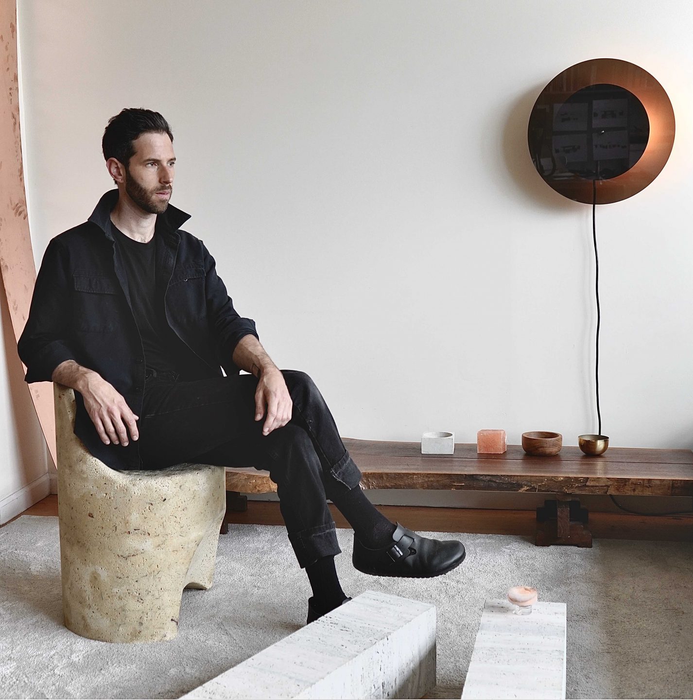 The designer's work explores ideas of time, balance, and sustainability