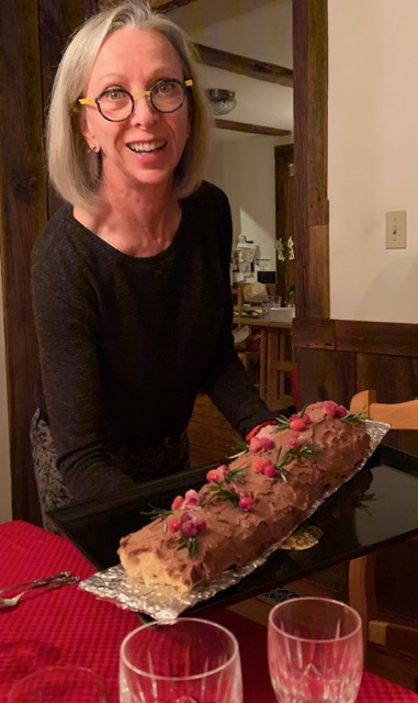 Cathy Kaufman holding a bûche de noel she baked last year