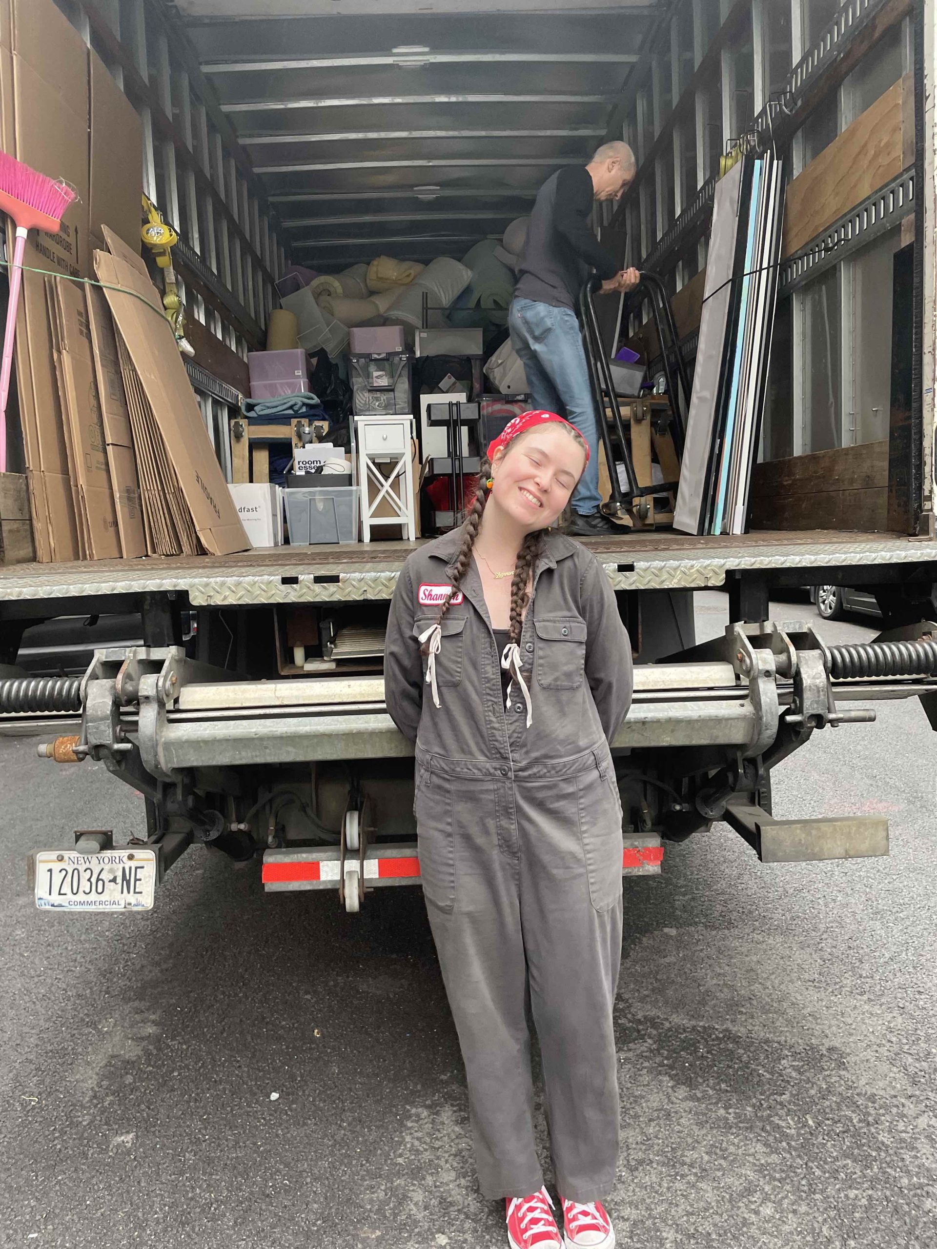 Hughes pictured with a truck filled with donations.