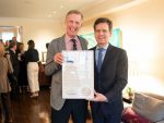 Greenwich Village Community Reception Celebrates New School Centennial New York State Senator Brad Hoylman (r) presents David Van Zandt with a proclamation honoring The New School's Centennial